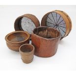 A collection of wooden kitchenalia comprising two sieves and three bowls. The largest sieve