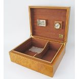 A cigar box / Humidor with Hygrometer dial, in a well figured quarter veneer burr walnut wood.