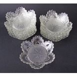 A collection of twelve star shaped dessert bowls in pressed clear glass, W16cm. (12)