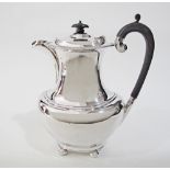 An ALPHA silver plated and silver soldered coffee pot with ebony handle. H23,5cm.