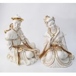 An Italian pair of gilt white porcelain / ceramic figures depicting Asians, Mid century. H30cm,