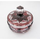 A Belgian Val St. Lambert Art Deco 1930s crystal bonbonniere with cover carved in a burgundy on