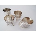 A Cypriot pair of egg cups 800, weight 57g, a Cypriot silver napkin ring weight 32g and a silver