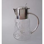 A German Wilhelm Wolff silver plated mounted crystal pitcher / claret jug, carved and engraved