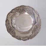 A Silver bowl with repousse rose decoration, Hallmarked 900, W13cm, weight 115g