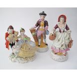 A collection of German porcelain figurines c1950s. H14,5cm and H19cm. (3)