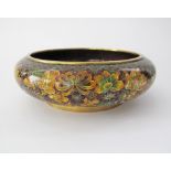 A large Chinese cloisonné bowl with everted rims decorated in the mille fiori pattern, mid 20th