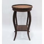 A Cypriot mid century beechwood round two tier side table on cabriole legs W36cm, H57cm.