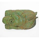 An Asian carved wood, green painted sleeping Buddha