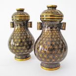 A pair of Chinese cloisonné lidded vases