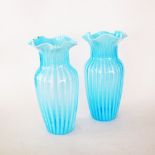 A pair of blue opaline vases
