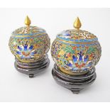 A pair of Chinese cloisonné round lidded boxes