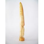A Tribal African ivory tusk carved with a head