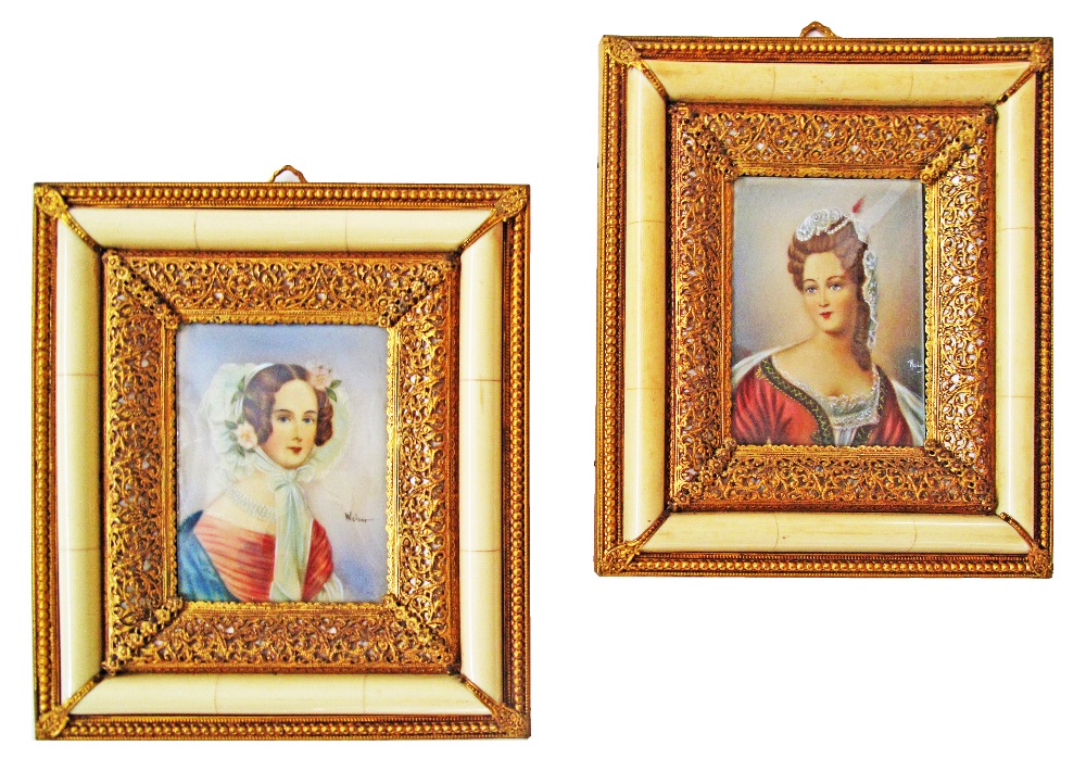 A pair of miniature watercolour portraits