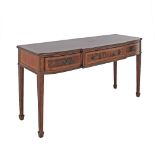 A Dining room dresser / console, in carved mahogany