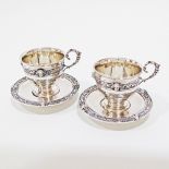 A Dutch pair of silver cups & saucers