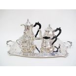 Silver tea set in a silver tray