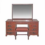 A mahogany veneered dressing table