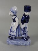 Delft-FigurDelft, weißer Scherben, Figurenpaar Knabe und Mädchen, Gebr.sp., H. 10