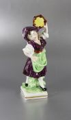 Rudolstadt-MusikerinRudolstadt, farbig staffierte Porzellanfigur einer jungen Frau mit Tambourin, im