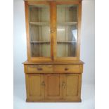 Victorian Glazed Pine Bookcase with Two Drawers and Cupboard. 49" W x 20" D x 85" H