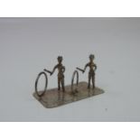 A Dutch Miniature Silver Figure of Two Children Playing with Hoops - Hallmarked with the Dutch Sword