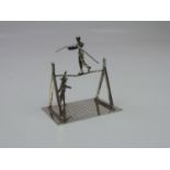 A Dutch Miniature Silver Tightrope Walker with Trainer Beneath - Hallmarked with the Dutch Sword