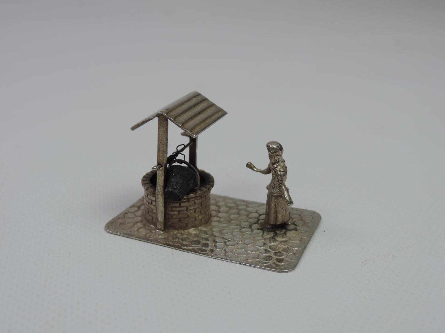 A Dutch Miniature Silver Well, with a Maiden About to Draw Water - Hallmarked with the Dutch Sword