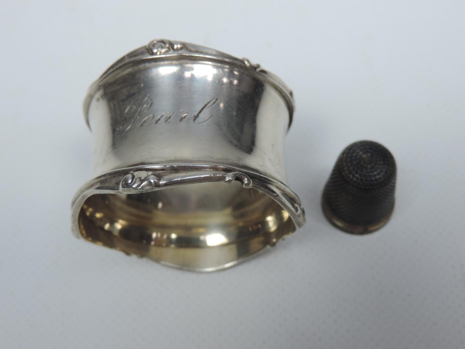 Silver Napkin Ring Engraved 'Pearl' and a Silver Thimble 'H.G&S The S.P.A' - Approximately 29 grams