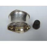 Silver Napkin Ring Engraved 'Pearl' and a Silver Thimble 'H.G&S The S.P.A' - Approximately 29 grams