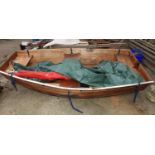 Small Wooden Boat with Oars and Cover - Seahopper Folder