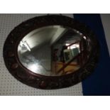 Oval Bevel Edge Mirror in Carved Frame