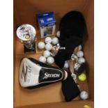 Quantity of Golf Balls and Sports Trophies