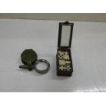 Miniature Magnifier and Set of Miniature Dominoes