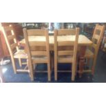 Pine Dining Table on Turned Legs with Four matching Rush Seated Chairs