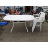 Plastic Garden Table and 4x Matching Chairs