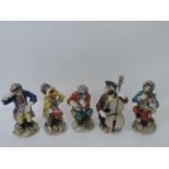 Porcelain 5 Piece Hand Painted Monkey Band Marked on Base with Cross Swords