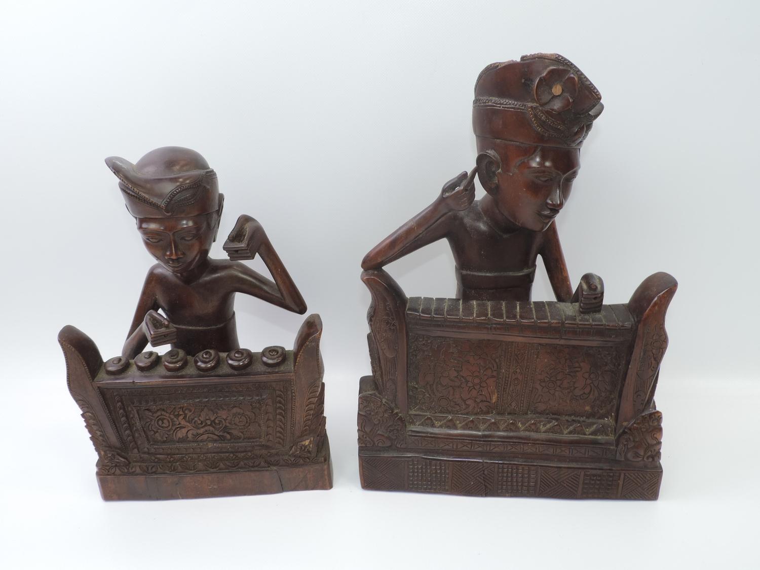 2x Large Carved Dark Wood Oriental Pieces Depicting Figures Playing Musical Instruments