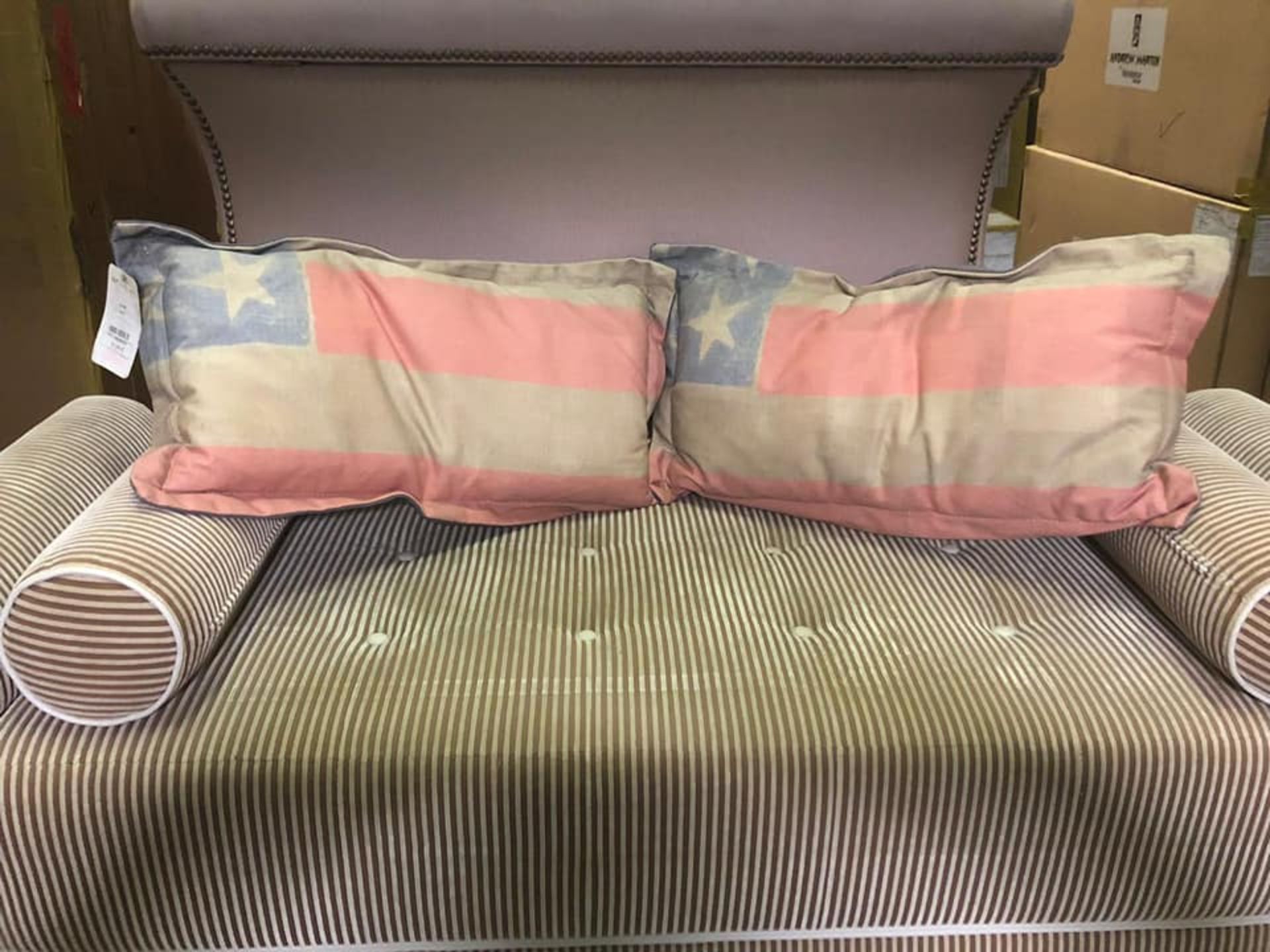 A Pair Of Small One Star Scatter Cushions
