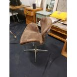 Reno Swivel Armchair Mocha Leather And Steel Add A Touch Of Equestrian Style To A Room With This