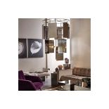 Kelly Hoppen Marilyn Chandelier Incorporates Multi-Tiered Rings Of Oversized, Cascading Metallic