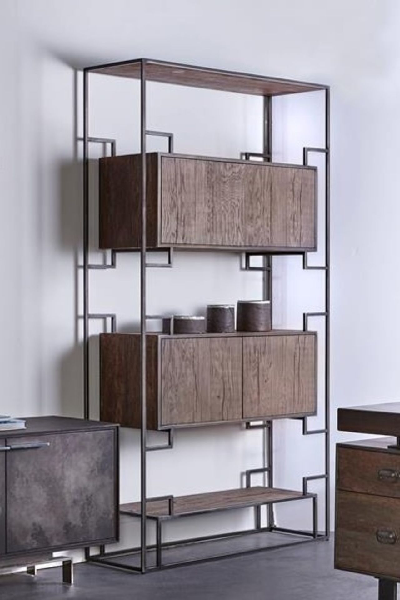 Juana Bookcase Epitomizing industrial chic style, this bookcase is handcrafted from a black powder