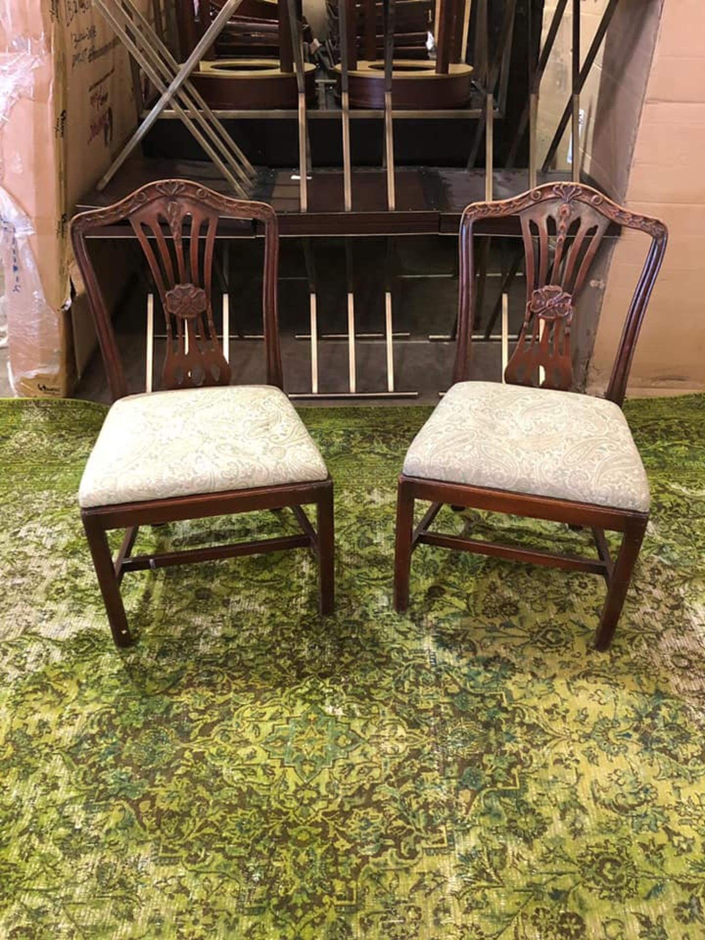 A Pair Of Victoria Styled Chairs Mahogany Frame Features An Arched Crest Rail Over A Pierced Back