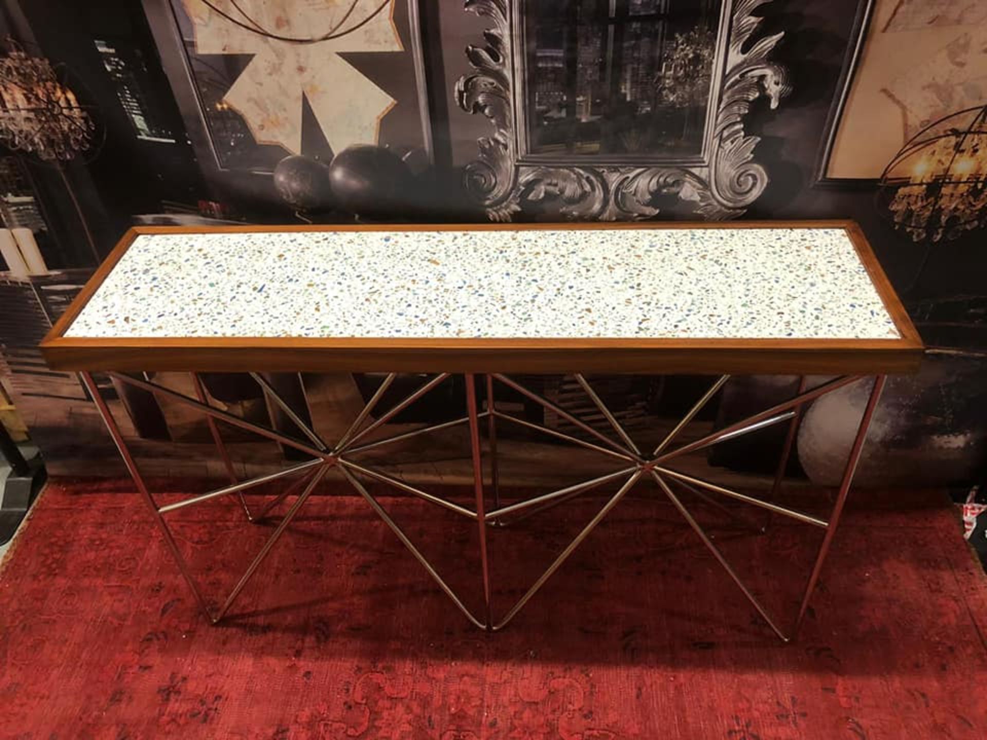 Starburst Console A rosewood-edged, sapphire terrazzo top sits beautifully atop a polished nickel