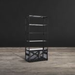 Spectrum Bookcase Inspired by industrial machines, the Spectrum collection is handcrafted from a