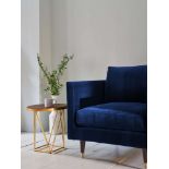 Henry Velvet Armchair Navy Blue Henry by Christiane Lemieux is a contemporary sofa and armchair