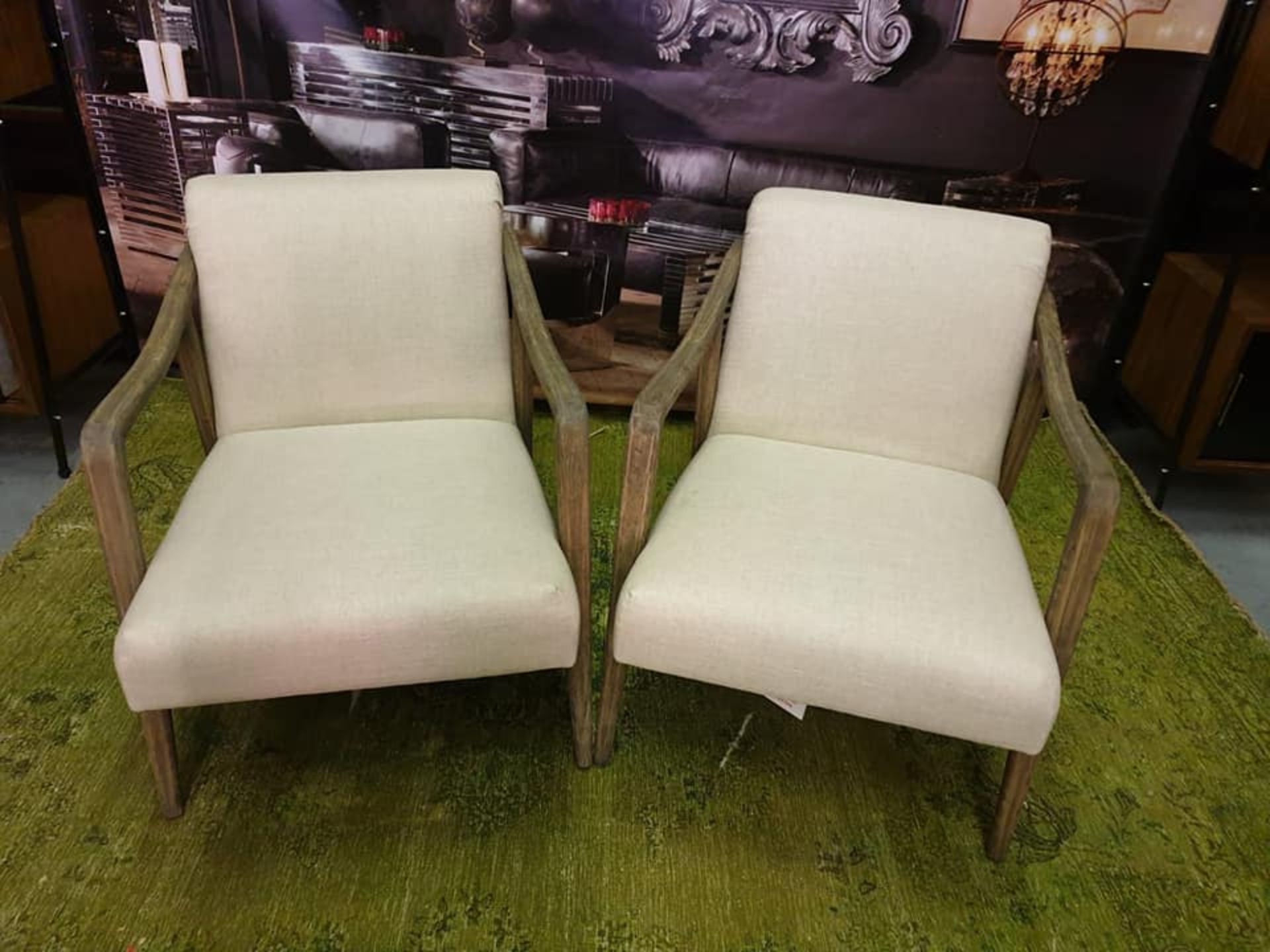 A pair of Alton Natural Ecru Linen Chairs The Alton chair is a classic and sophisticated weathered