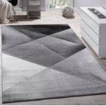 Asymmetrical Grey/Black Rug This Rug Will Enliven Up Your Home With Its Asymmetrical Lines Thanks To