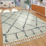 Flokati Cream RugJute Backed Geometric Cream Shag & Flokati Area Rug Shaggy In Appearance And