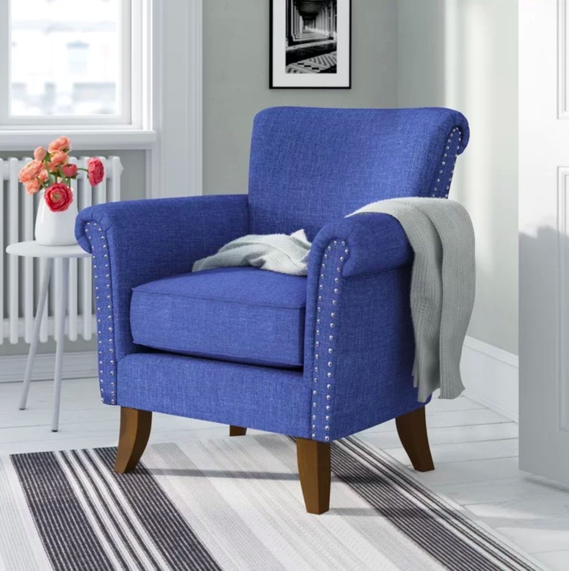 Contemporary Armchair A Stylish And Bold Contemporary Armchair With Winged Feet Upholstered In